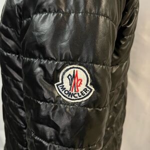 Shiny Black Quilted Jacket with Fur Collar. Luxury designer look